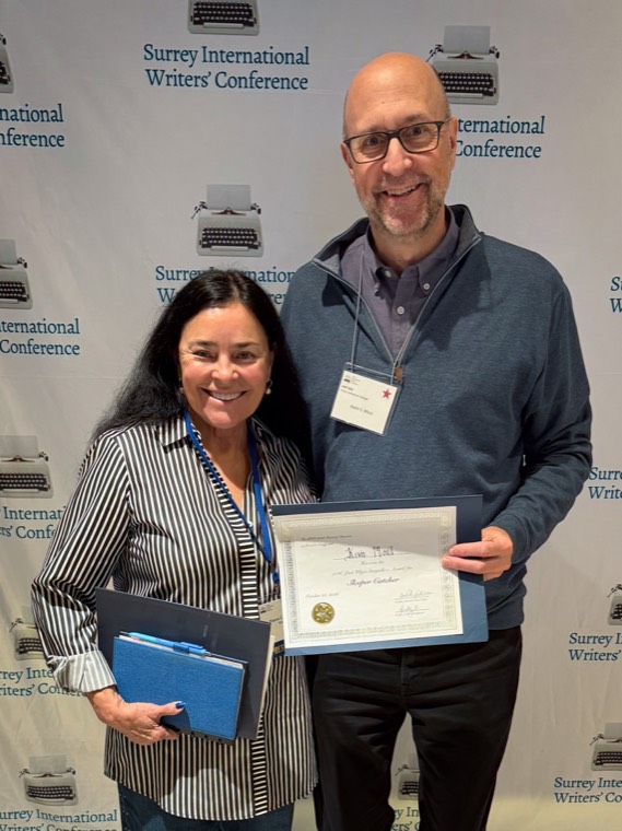 Kevin S. Moul receiving the Jack Whyte Storyteller’s Award with Diana Gabaldon